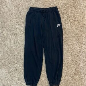 Black Nike sweatpants; size: women’s Small